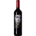 Wine bottle with a label featuring a face on a white background