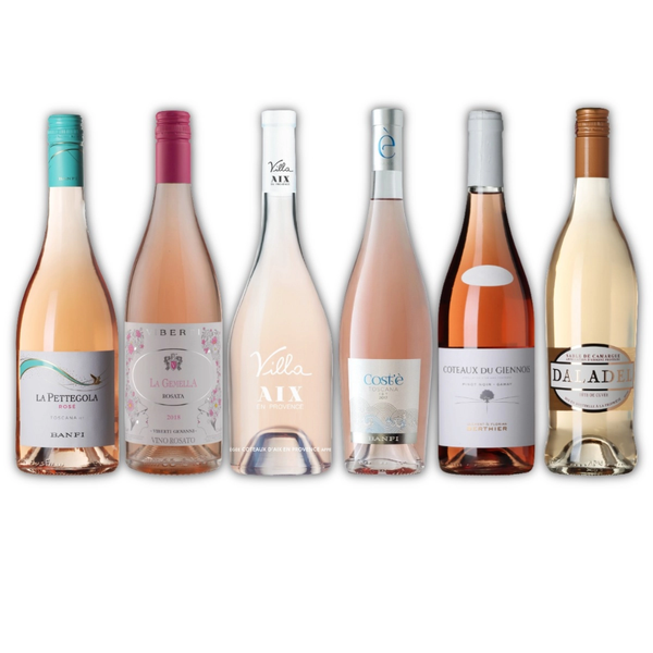 Seks flasker rosévin fra Vores Eksklusive Roséfavoritter på en hvid baggrund