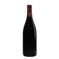 Red wine bottle with a visible label on a white background
