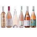 
Seks flasker rosévin fra Vores Eksklusive Roséfavoritter på en hvid baggrund